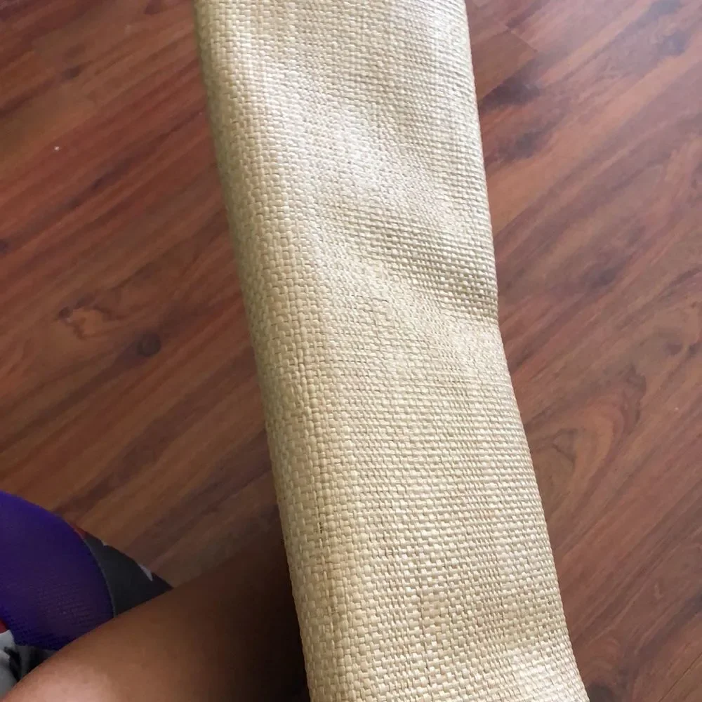 BUZZ by Jane Fox Bamboo handle woven rattan bag.